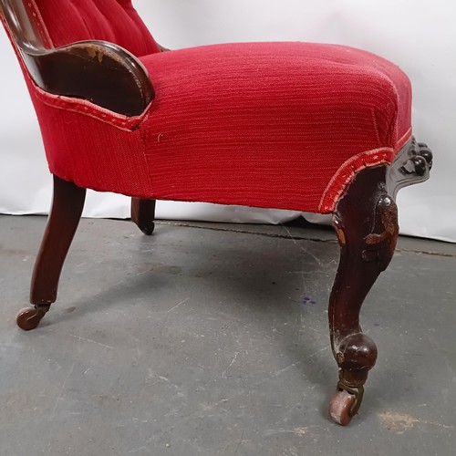 50 - A Victorian mahogany button back nursing chair