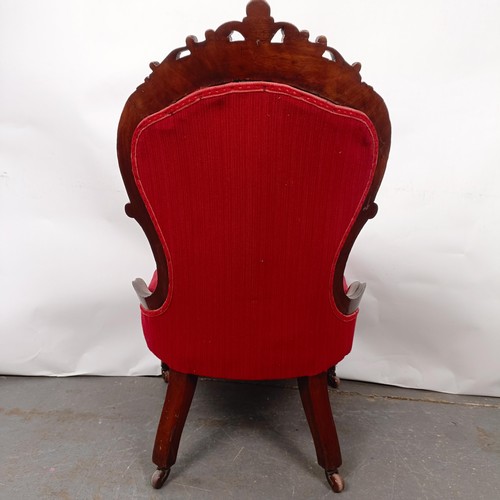 50 - A Victorian mahogany button back nursing chair