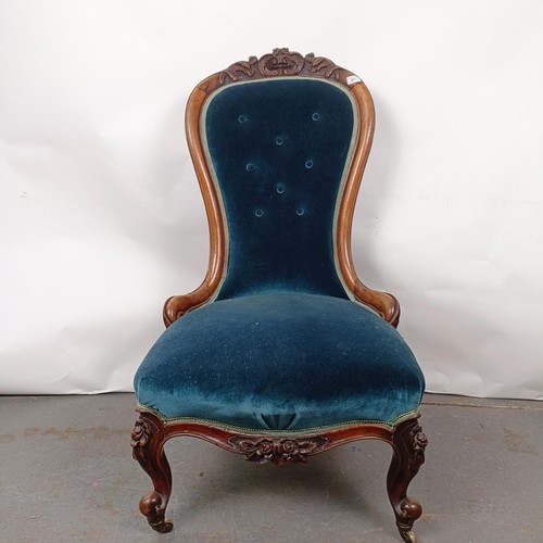 51 - A Victorian mahogany framed button nursing chair