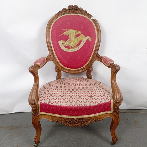 55 - A 19th Century French walnut framed armchair