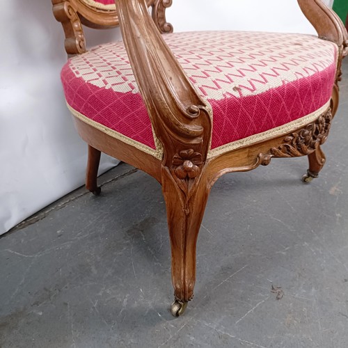 55 - A 19th Century French walnut framed armchair