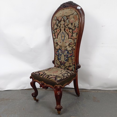 56 - A 19th century Continental mahogany framed nursing chair, with a tapestry back and seat