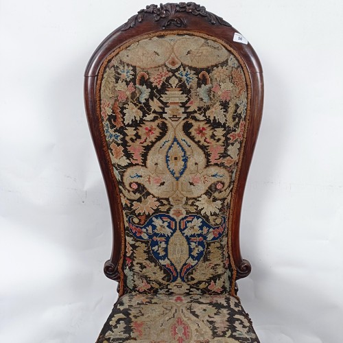 56 - A 19th century Continental mahogany framed nursing chair, with a tapestry back and seat