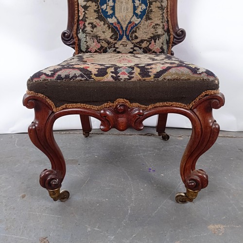 56 - A 19th century Continental mahogany framed nursing chair, with a tapestry back and seat