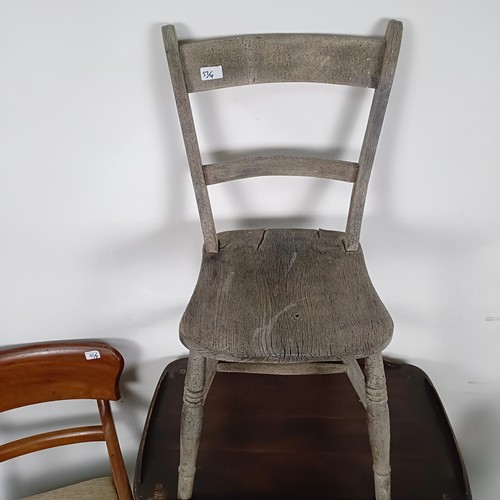 57 - A mahogany armchair, a painted chair, an Ercol type trolley, and a kitchen chair (4)