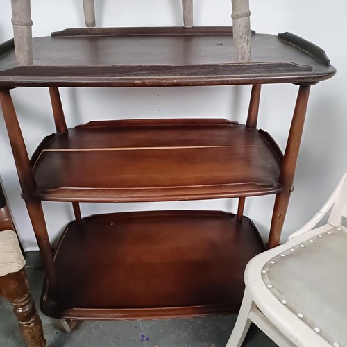 57 - A mahogany armchair, a painted chair, an Ercol type trolley, and a kitchen chair (4)