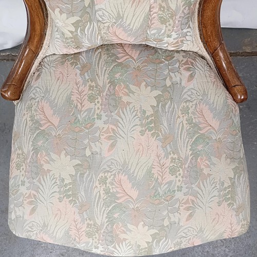 59 - A Victorian walnut framed button back nursing chair