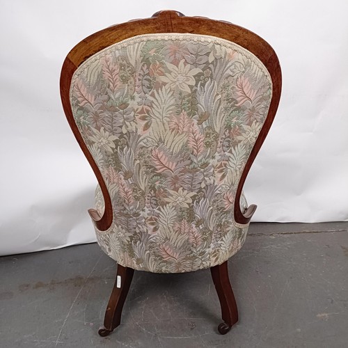 59 - A Victorian walnut framed button back nursing chair