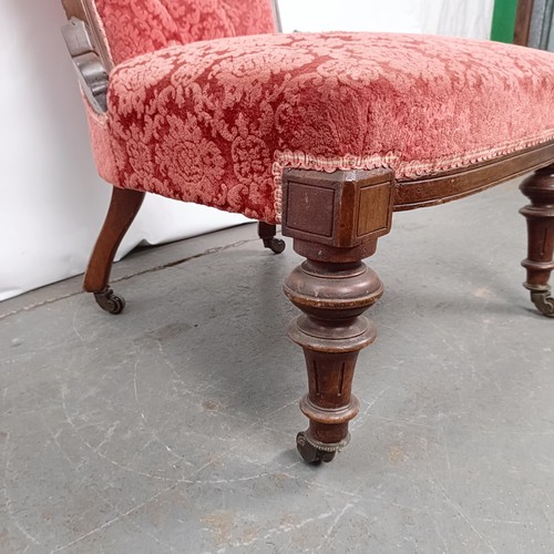 61 - A late 19th century walnut framed button back nursing chair