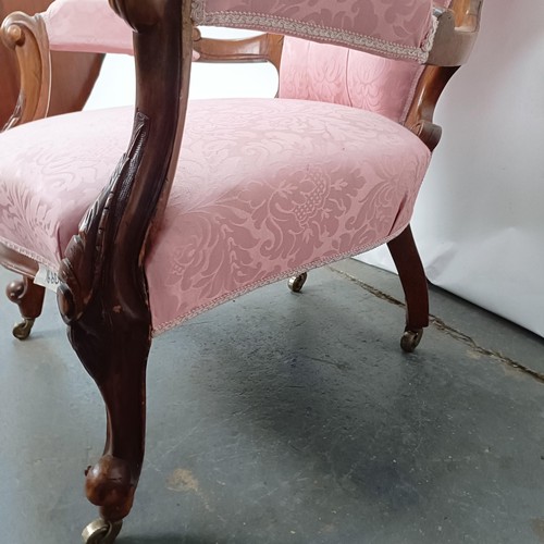 63 - A 19th century walnut framed button back armchair