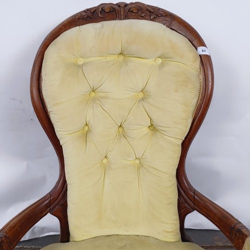 64 - A 19th century walnut framed button back armchair