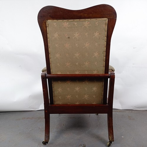 65 - A 19th century mahogany framed reclining chair