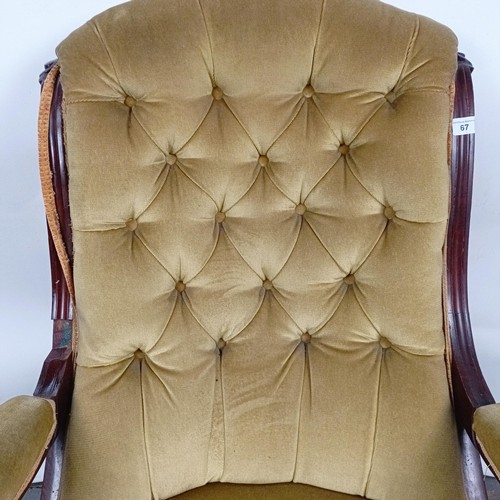 67 - A Victorian mahogany framed button back armchair