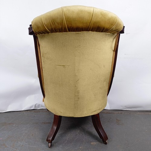 67 - A Victorian mahogany framed button back armchair