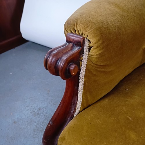 68 - A Victorian mahogany framed button back armchair