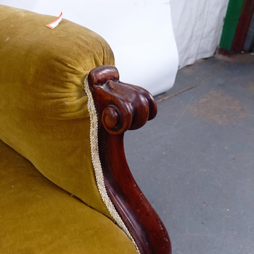 68 - A Victorian mahogany framed button back armchair