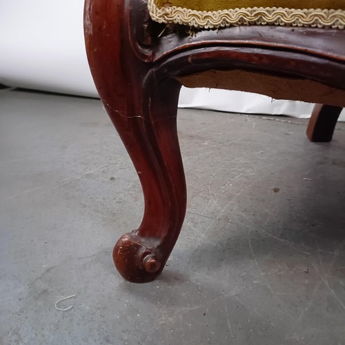 68 - A Victorian mahogany framed button back armchair