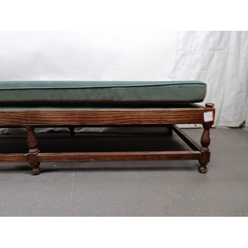 73 - An oak frame day bed, 200 cm wide