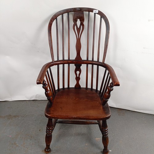 79 - A Windsor style armchair