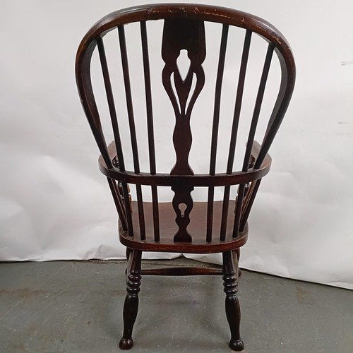 79 - A Windsor style armchair