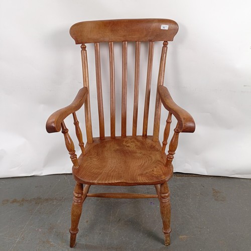 82 - A Victorian Windsor style  armchair