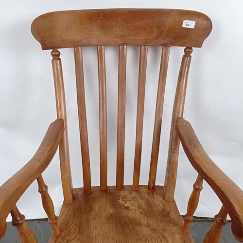 82 - A Victorian Windsor style  armchair