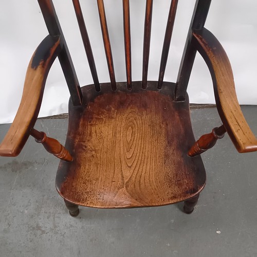 83 - A Victorian stained pine Windsor style armchair