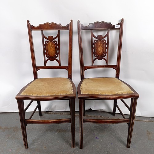 86 - A pair of early 20th century bedroom inlaid chairs