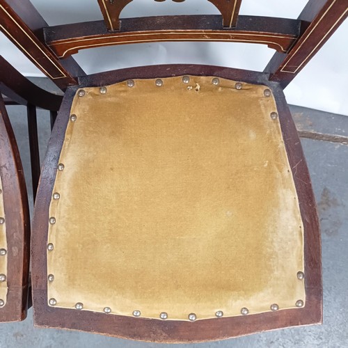 86 - A pair of early 20th century bedroom inlaid chairs