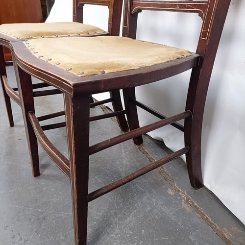 86 - A pair of early 20th century bedroom inlaid chairs