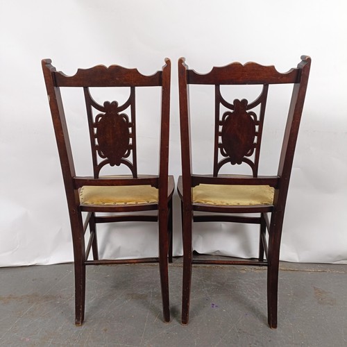 86 - A pair of early 20th century bedroom inlaid chairs