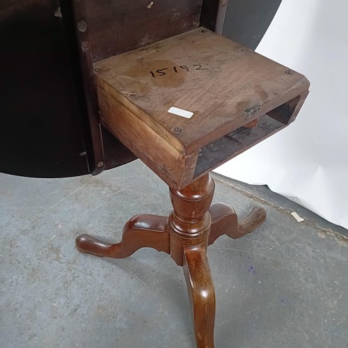 92 - A Victorian mahogany tilt top table, on a column support to a tripod base, 86 cm diameter