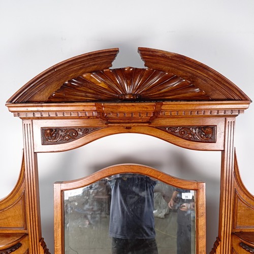 96 - A 19th century walnut kneehole dressing table, superstructure carved shell, fruit and dragons, on a ... 