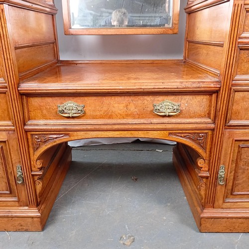 96 - A 19th century walnut kneehole dressing table, superstructure carved shell, fruit and dragons, on a ... 