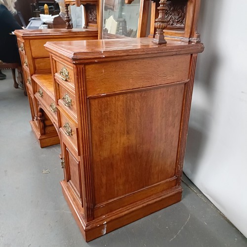 96 - A 19th century walnut kneehole dressing table, superstructure carved shell, fruit and dragons, on a ... 