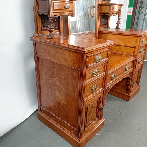 96 - A 19th century walnut kneehole dressing table, superstructure carved shell, fruit and dragons, on a ... 