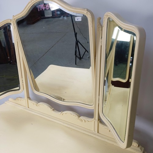 97 - A painted kneehole dressing table, 143 cm wide