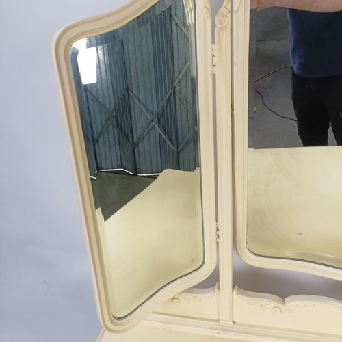 97 - A painted kneehole dressing table, 143 cm wide