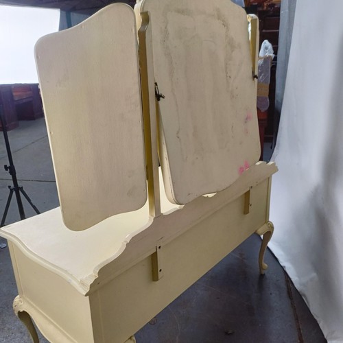 97 - A painted kneehole dressing table, 143 cm wide