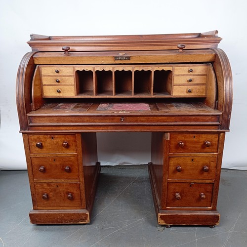 106 - A 19th century mahogany cylinder front bureau, 119 cm wide