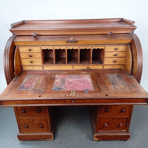 106 - A 19th century mahogany cylinder front bureau, 119 cm wide