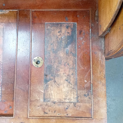 106 - A 19th century mahogany cylinder front bureau, 119 cm wide