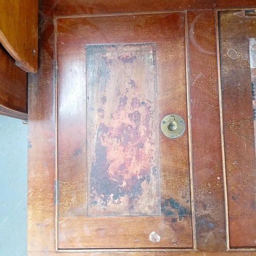 106 - A 19th century mahogany cylinder front bureau, 119 cm wide