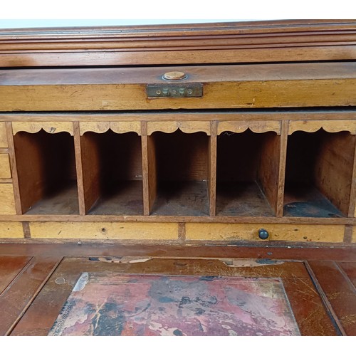 106 - A 19th century mahogany cylinder front bureau, 119 cm wide