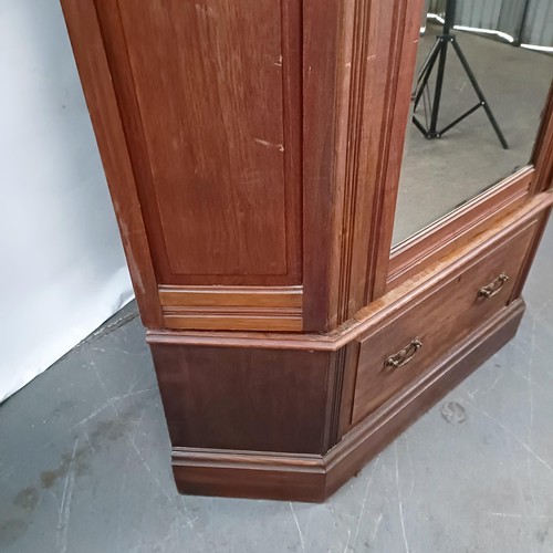 108 - A unusual Edwardian walnut corner wardrobe, with a single mirrored door, 203 cm high x 109 cm wide