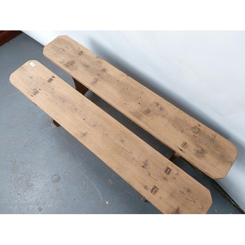 105 - A pair of pine benches or forms, 130 cm wide (2)