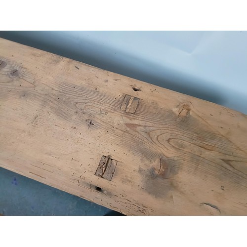 105 - A pair of pine benches or forms, 130 cm wide (2)