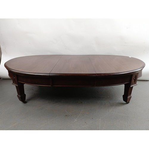 107 - A mahogany coffee table, 47 cm high x 107 cm deep x 182 cm wide, converted from a dining table