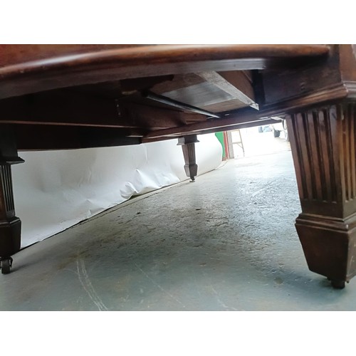 107 - A mahogany coffee table, 47 cm high x 107 cm deep x 182 cm wide, converted from a dining table