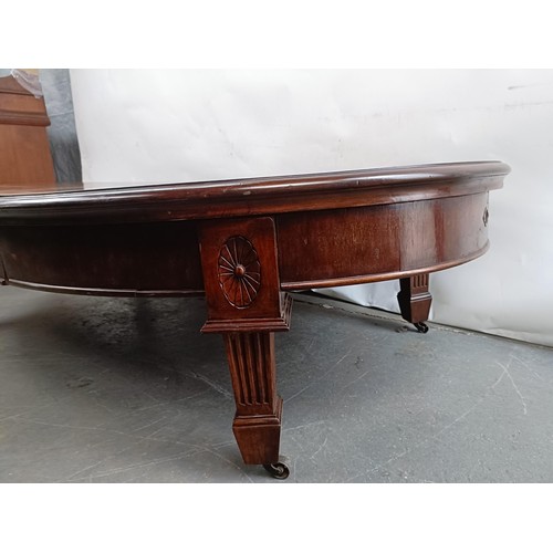 107 - A mahogany coffee table, 47 cm high x 107 cm deep x 182 cm wide, converted from a dining table